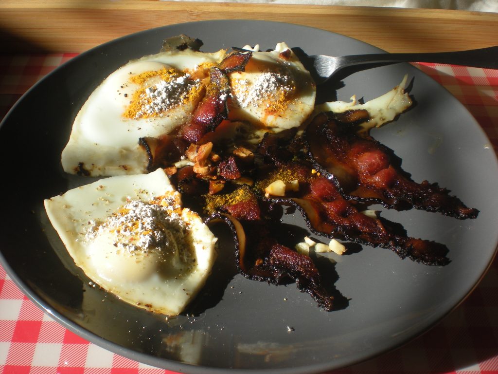 Bacon and eggs - an Average Joe breakfast with tumeric, garlic, black pepper, and ground silica.