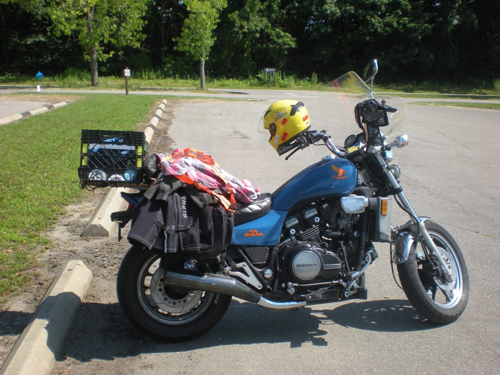 Maggie, with my gear on the seat, parked at Headlands Beach State Park in Mentor, Ohio (July 2024)