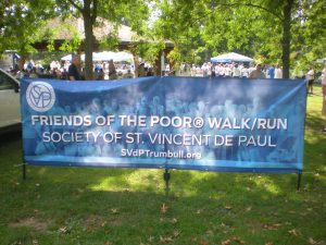 Friends of the Poor Walk/Run Banner: Society of St. Vincent de Paul.