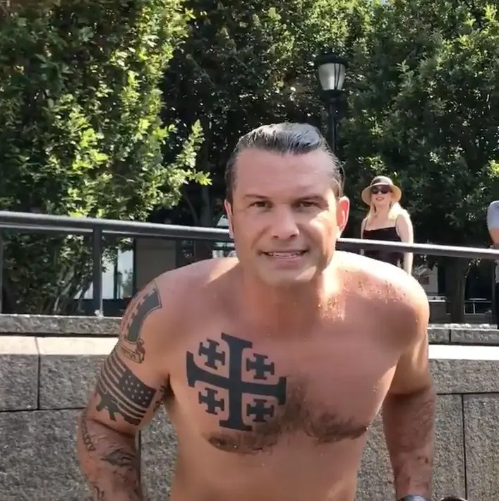 Image of Secretary of Defense nominee Pete Hegseth showing his Christian Jerusalem Cross Tattoo.