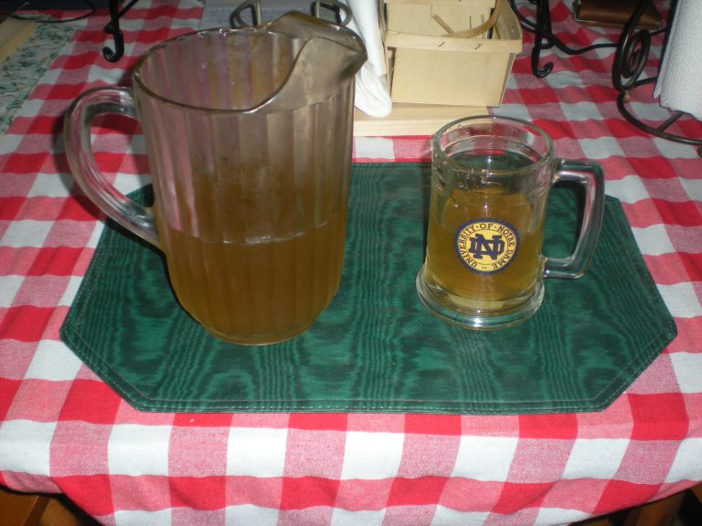Homemade Grapefruit-Peppermint IPA-like Brew Homemade grapefruit-peppermint IPA-like beverage in a pitcher and a Notre Dame glass mug.
