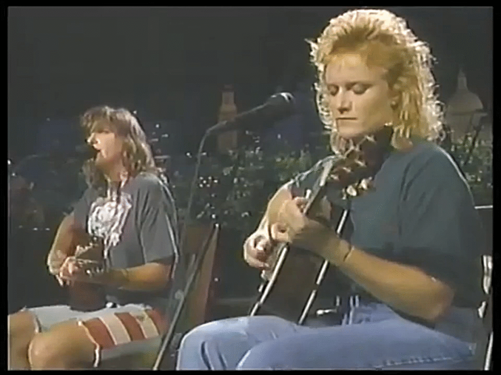 Amy Ray's Patriotic flag shorts (left leg) Amy Ray of the Indigo Girls wearing the USA- or Confederate-flag adorned shorts (left leg) from the Sep. 1991 concert at Austin City Limits
