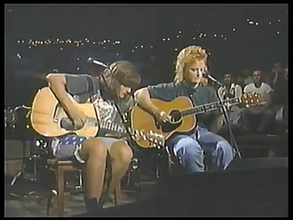 Amy Ray's Patriotic flag shorts (right leg) Amy Ray of the Indigo Girls wearing the USA- or Confederate-flag adorned shorts (right leg) from the Sep. 1991 concert at Austin City Limits