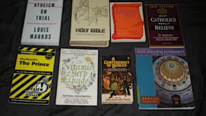 Eight books from the Menagerie by AWL thrift shop in Niles, Ohio.