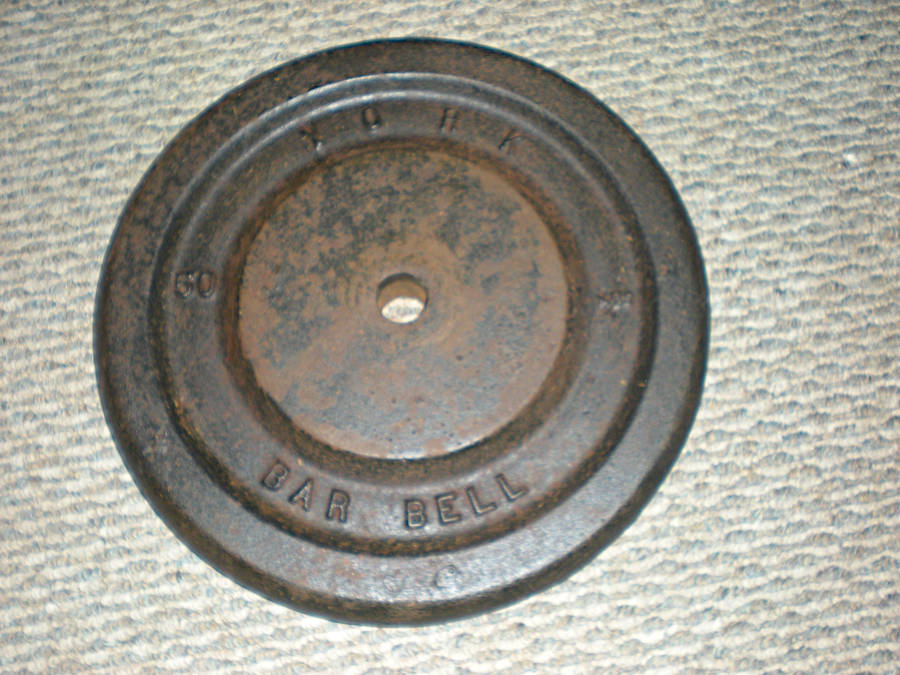 Made-in-USA, vintage 1" diameter York iron weight plate.