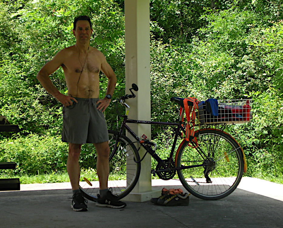 Joey Af post 7-mile run on Summer Solstice 2026, late-morning. Also, the commuter bicycle and a book by Fyodor Fyodor Dostoevsky in the bicycle basket.